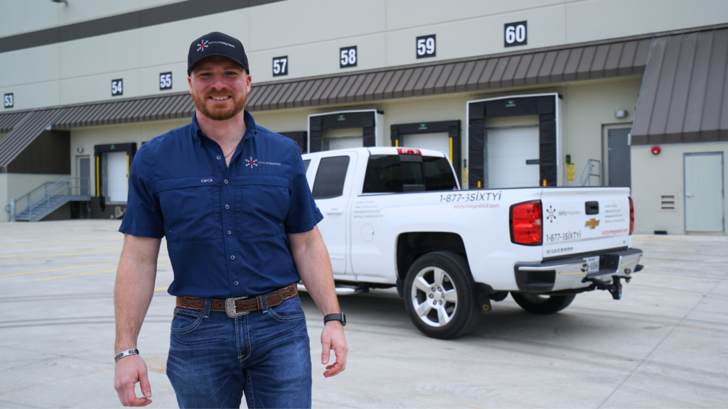 Richard Mckinney smiling in front of a 3Sixty Integrated truck. In this blog we discuss his career story